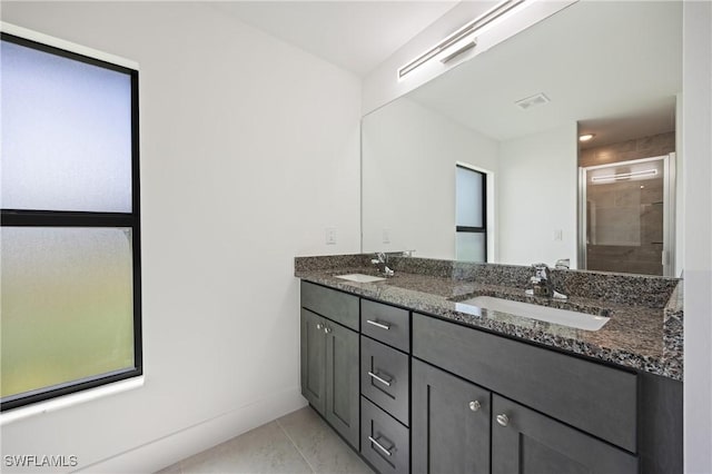 2611 NE 22nd Ave, Cape Coral, FL 33909 - full bathroom with double vanity and a stall shower