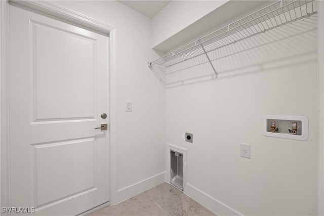 2611 NE 22nd Ave, Cape Coral, FL 33909 - laundry room featuring hookup for an electric dryer, baseboards, and hookup for a washing machine