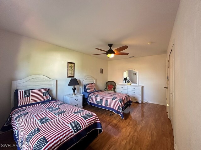 bedroom featuring ceiling fan and hardwood / wood-style flooring