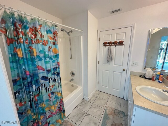 bathroom with vanity and shower / tub combo with curtain