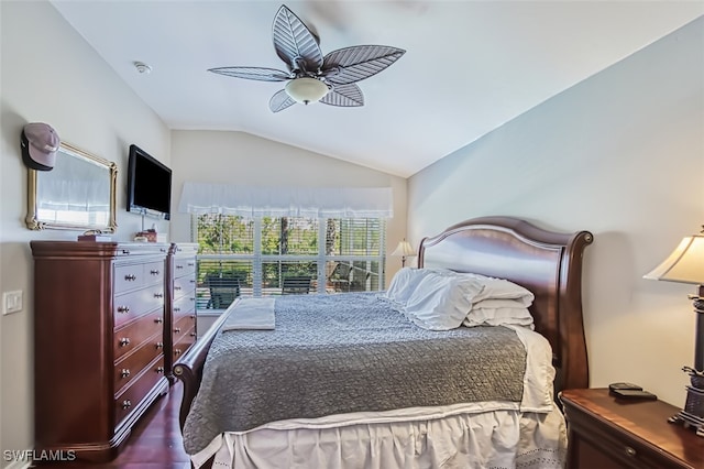 bedroom with multiple windows, wood-type flooring, lofted ceiling, and ceiling fan