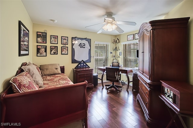 office space featuring ceiling fan and dark hardwood / wood-style flooring