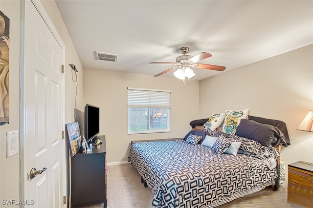 carpeted bedroom with ceiling fan