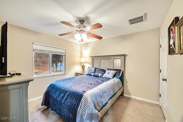 carpeted bedroom featuring ceiling fan