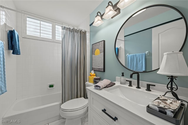 full bathroom featuring vanity, toilet, and shower / tub combo with curtain