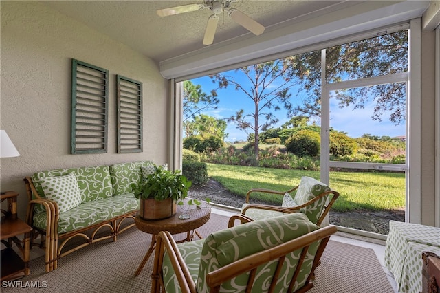 sunroom / solarium with ceiling fan and a wealth of natural light