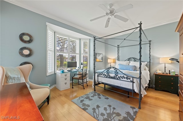 bedroom featuring ceiling fan, light wood-type flooring, and ornamental molding