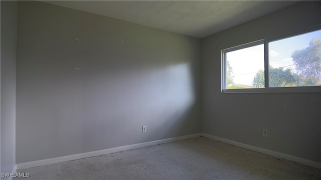 empty room with a textured ceiling