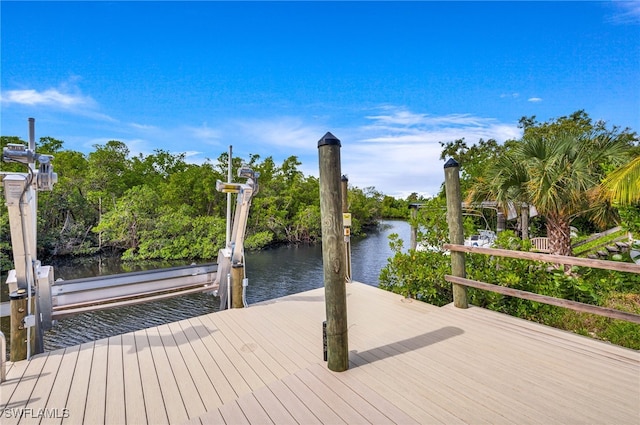 dock area featuring a water view