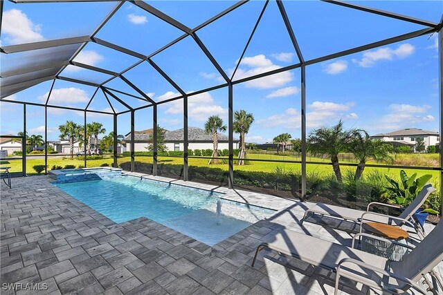 view of swimming pool featuring a lanai, a patio, and an in ground hot tub