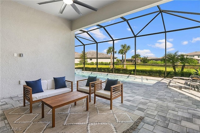 view of patio / terrace with outdoor lounge area, ceiling fan, and a lanai