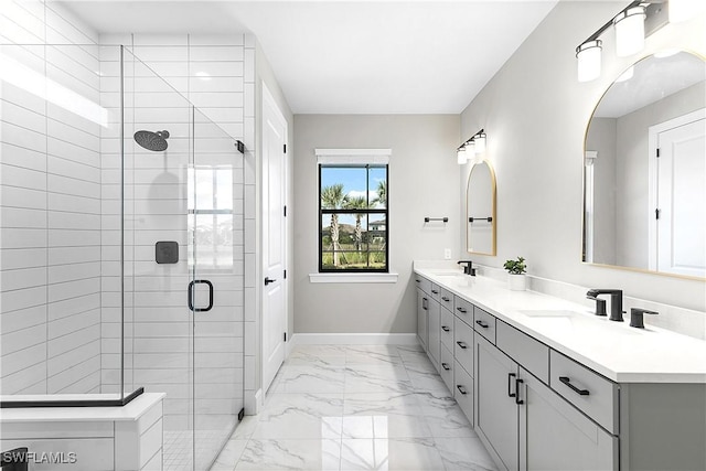 bathroom featuring vanity and a shower with shower door