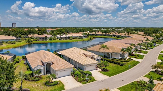 bird's eye view with a water view