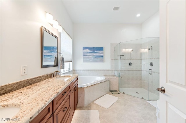 24800 Hollybrier Ln, Bonita Springs, FL 34134 - full bath with double vanity, a bath, tile patterned flooring, and a shower stall