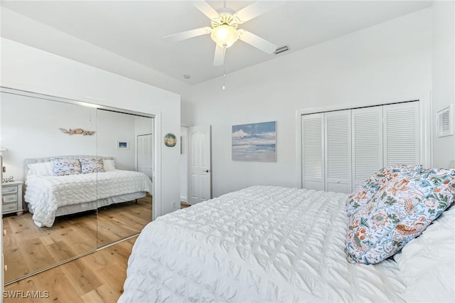 24800 Hollybrier Ln, Bonita Springs, FL 34134 - bedroom featuring wood finished floors, a high ceiling, and ceiling fan
