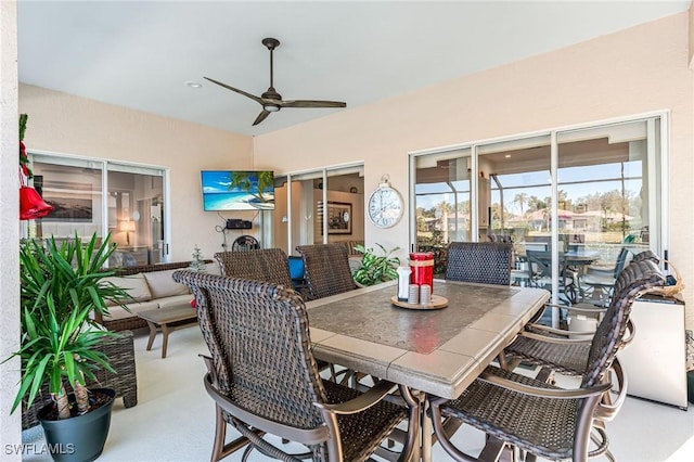 view of patio featuring outdoor lounge area and ceiling fan