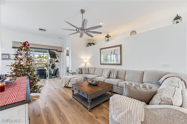 24800 Hollybrier Ln, Bonita Springs, FL 34134 - living room with light wood-style flooring and a ceiling fan