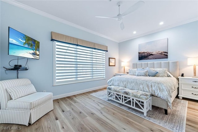 bedroom featuring ceiling fan, ornamental molding, and light hardwood / wood-style flooring