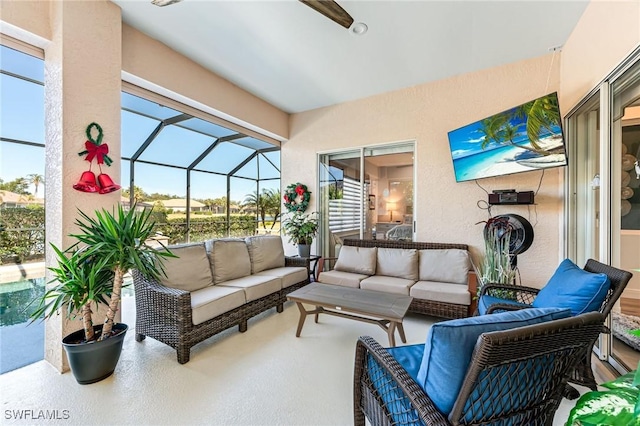 view of patio with glass enclosure and an outdoor hangout area