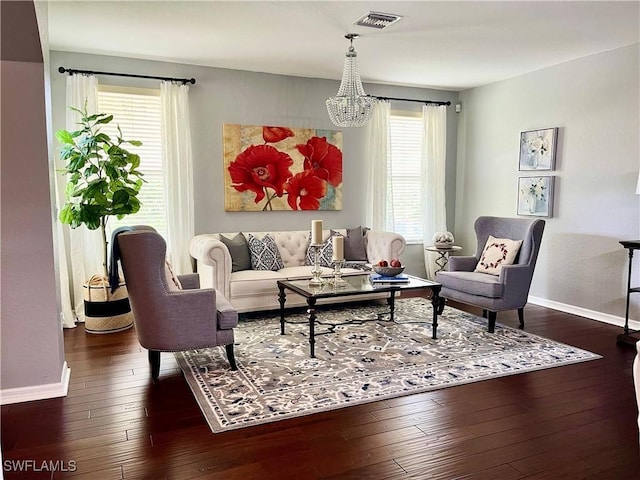 2004 Par Dr, Naples, FL 34120 - living area featuring visible vents, baseboards, dark wood-style flooring, and a chandelier