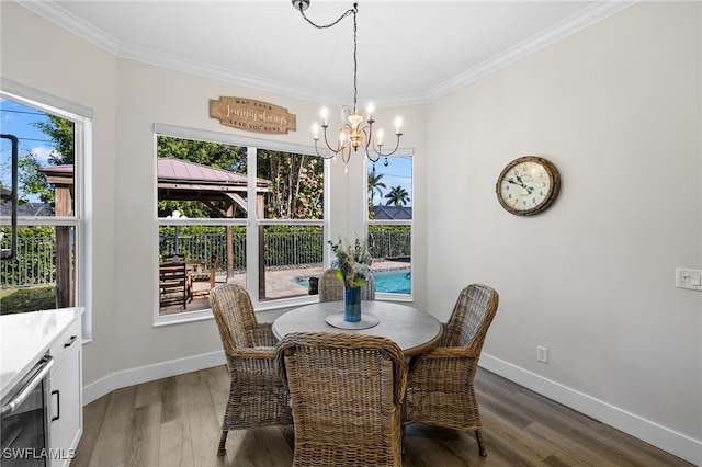 3684 Sudbury Ln, Bonita Springs, FL 34134 - dining room with a chandelier, light wood-style flooring, crown molding, and beverage cooler