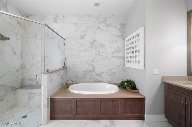 3684 Sudbury Ln, Bonita Springs, FL 34134 - bathroom with a garden tub, marble look tiles, a marble finish shower, and vanity