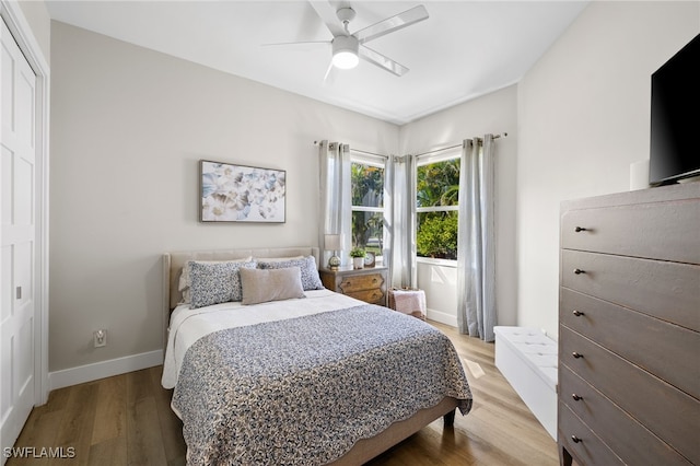 3684 Sudbury Ln, Bonita Springs, FL 34134 - bedroom featuring light wood finished floors and ceiling fan