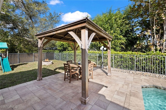 3684 Sudbury Ln, Bonita Springs, FL 34134 - fenced backyard featuring a patio area, a gazebo, and outdoor dining area
