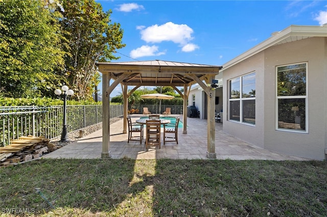 3684 Sudbury Ln, Bonita Springs, FL 34134 - fenced backyard with a gazebo and a patio area