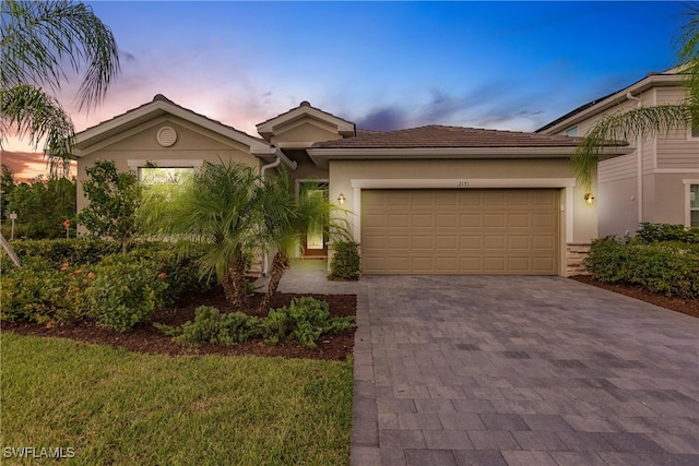 view of front of home with a garage