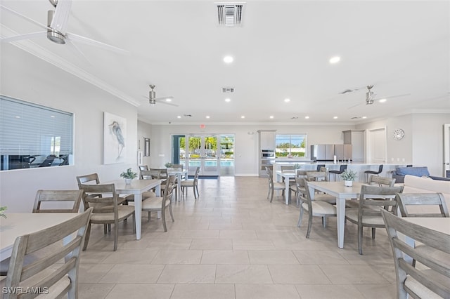 tiled dining space with crown molding