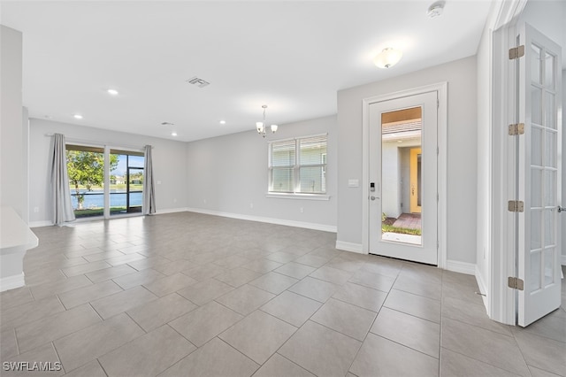 interior space featuring an inviting chandelier