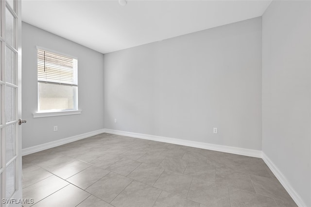 view of tiled spare room