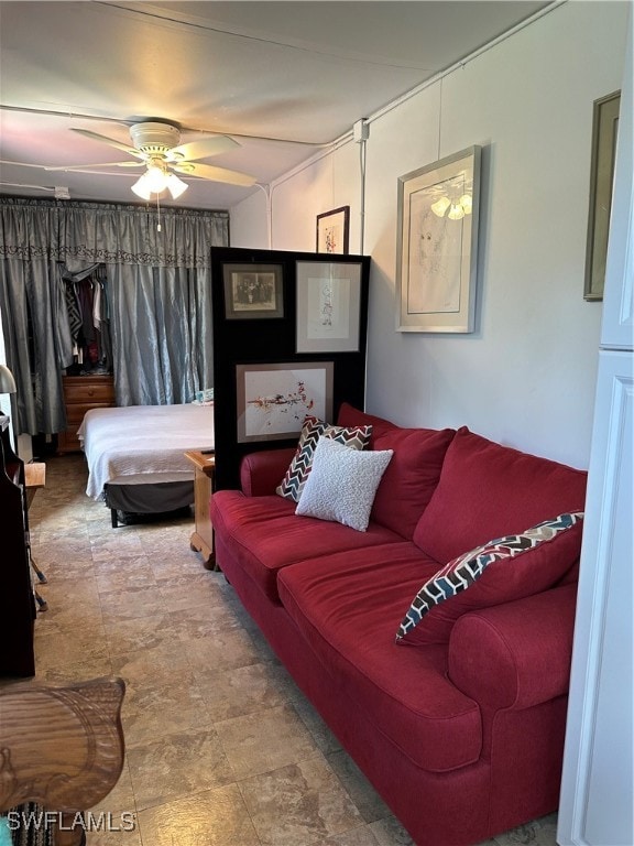 living room featuring ceiling fan