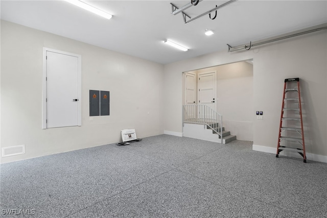 garage with baseboards