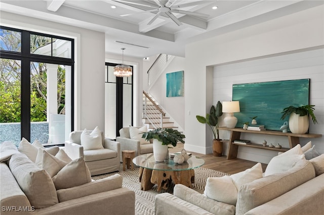 living room featuring beamed ceiling, coffered ceiling, recessed lighting, and wood finished floors