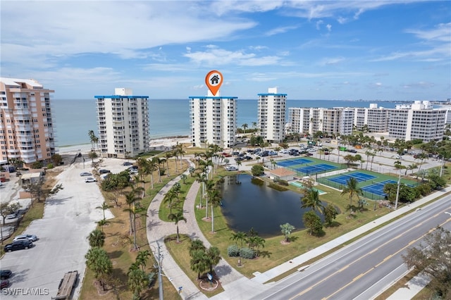 birds eye view of property featuring a water view