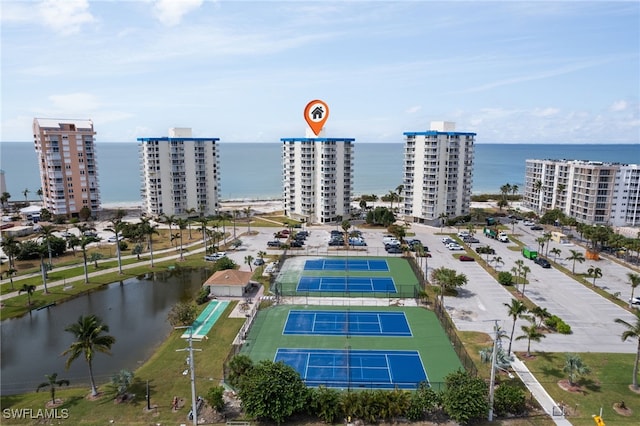 birds eye view of property featuring a water view