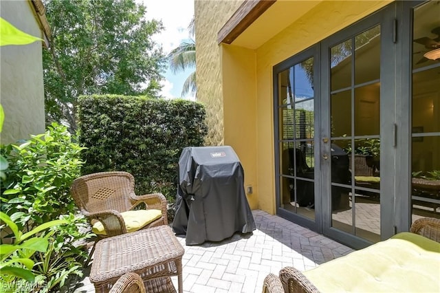 view of patio / terrace featuring french doors and grilling area