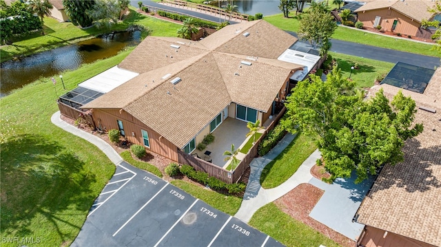 bird's eye view with a water view