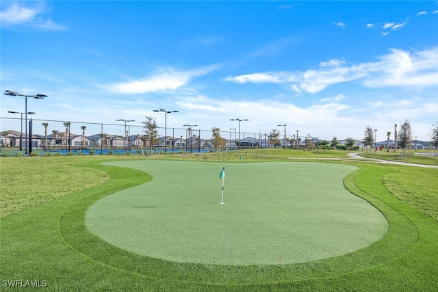 view of community featuring a yard