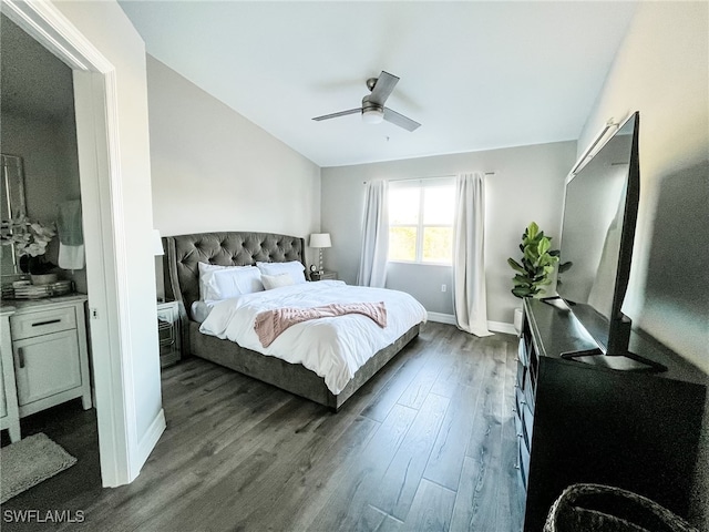 bedroom with ceiling fan and dark wood-type flooring