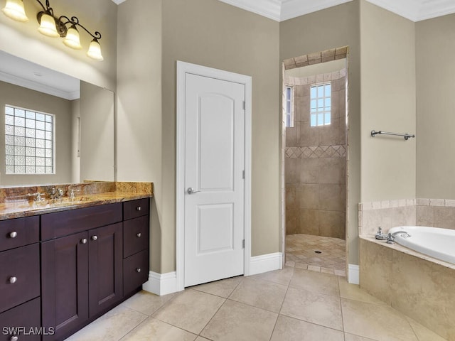 bathroom featuring independent shower and bath, vanity, ornamental molding, and tile patterned floors