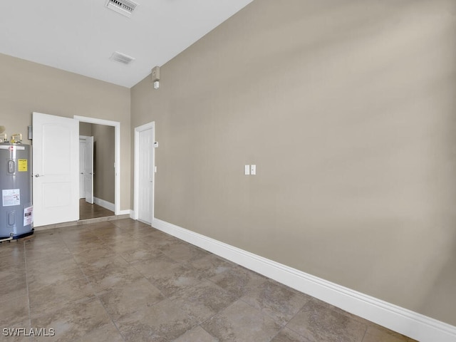 empty room featuring electric water heater