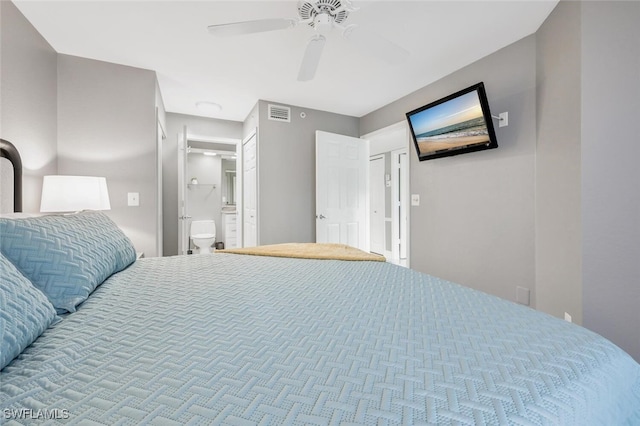 bedroom with ceiling fan and connected bathroom