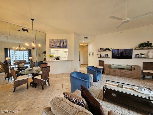 living room with ceiling fan with notable chandelier, light tile patterned flooring, and visible vents