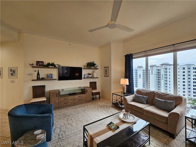 living area featuring light tile patterned floors, ceiling fan, and ornamental molding