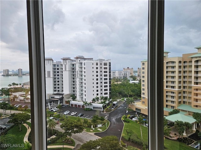 property's view of city featuring a water view