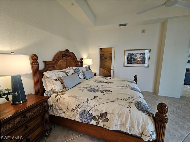 bedroom with visible vents, a spacious closet, and light tile patterned floors