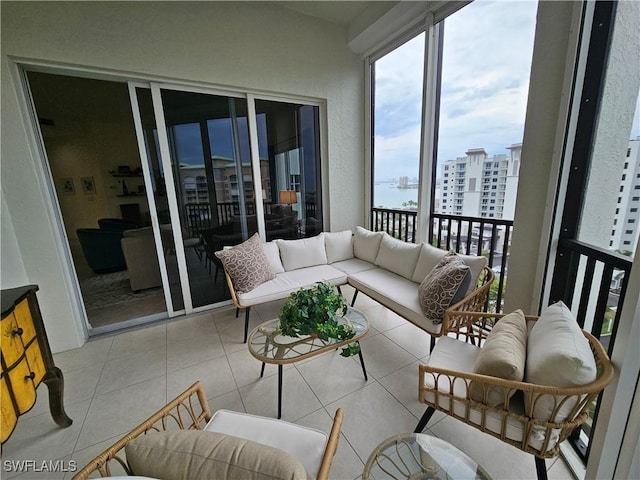 balcony with a view of city and outdoor lounge area